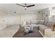 Bright living room featuring neutral colors, a ceiling fan, and a large sectional at 6340 N 34Th Pl, Paradise Valley, AZ 85253