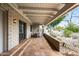 Spacious covered patio with brick flooring and a dining table, perfect for outdoor entertaining at 6340 N 34Th Pl, Paradise Valley, AZ 85253