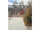 Backyard with patio, rock landscaping, and seating area at 6527 W Adams St, Phoenix, AZ 85043