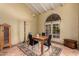 Cozy dining room with a wooden table, tile floors, and bright natural light at 6701 N Scottsdale Rd # 15, Scottsdale, AZ 85250