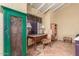 Charming sitting room with a vintage desk, offering a cozy and private space at 6701 N Scottsdale Rd # 15, Scottsdale, AZ 85250