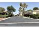 This street is lined with beautiful homes with lush landscaping and mature trees at 6701 N Scottsdale Rd # 15, Scottsdale, AZ 85250