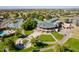 Aerial view of community center surrounded by lush landscaping and tennis courts at 7401 W Arrowhead Clubhouse Dr # 2003, Glendale, AZ 85308