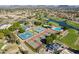 Aerial view showcasing multiple tennis courts, landscaping, and recreational facilities at 7401 W Arrowhead Clubhouse Dr # 2003, Glendale, AZ 85308