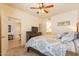 Inviting bedroom with ample light, ceiling fan, and decorative wall art at 7401 W Arrowhead Clubhouse Dr # 2003, Glendale, AZ 85308