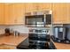 This kitchen features modern stainless steel appliances and ample counter space at 7401 W Arrowhead Clubhouse Dr # 2003, Glendale, AZ 85308