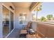 Spacious patio with shade features comfortable seating and a nice view at 7401 W Arrowhead Clubhouse Dr # 2003, Glendale, AZ 85308