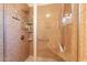 Luxurious shower with stone accents, a built-in seat, and updated hardware at 7401 W Arrowhead Clubhouse Dr # 2003, Glendale, AZ 85308