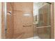 Beautifully tiled walk-in shower with a seat and grab bar for easy access at 7401 W Arrowhead Clubhouse Dr # 2003, Glendale, AZ 85308