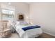 Cozy bedroom with a rocking chair and bright natural light at 8607 E Preserve Way, Scottsdale, AZ 85266