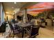 Inviting patio with outdoor seating, grill, and a cozy ambiance perfect for entertaining guests at 8607 E Preserve Way, Scottsdale, AZ 85266