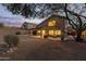 Inviting backyard with desert landscaping and a spacious patio area for outdoor living at 10468 E Raintree Dr, Scottsdale, AZ 85255