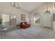 Bright, spacious living room featuring high ceilings, neutral tones, and stylish decor at 10468 E Raintree Dr, Scottsdale, AZ 85255