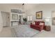 Bright, spacious living room featuring high ceilings, neutral tones, and stylish decor at 10468 E Raintree Dr, Scottsdale, AZ 85255