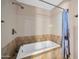 Bathroom featuring a large soaking tub at 10842 W Sarabande Cir, Sun City, AZ 85351