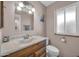 Well-lit bathroom with stylish vanity and fixtures at 10842 W Sarabande Cir, Sun City, AZ 85351