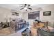 Bedroom featuring a ceiling fan and a window with blinds at 10842 W Sarabande Cir, Sun City, AZ 85351