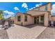 Spacious backyard featuring a paved patio, ideal for outdoor gatherings and enjoying the serene surroundings at 12887 N 93Rd Dr, Peoria, AZ 85381
