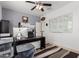 Well-lit home office featuring a modern desk, ample workspace, and neutral tones for a productive atmosphere at 12887 N 93Rd Dr, Peoria, AZ 85381