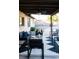 Inviting covered patio with comfortable seating, perfect for outdoor relaxation and entertaining at 13219 N 46Th Pl, Phoenix, AZ 85032