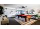 Spacious game room featuring a pool table and stylish decor at 13219 N 46Th Pl, Phoenix, AZ 85032