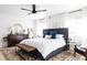 Spacious main bedroom with ceiling fan, rug, and natural light at 13219 N 46Th Pl, Phoenix, AZ 85032