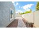An enclosed backyard has rock features and paver walkway at 13616 N 41 Pl, Phoenix, AZ 85032