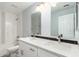 A pristine bathroom offers double sinks and a tiled shower at 13616 N 41 Pl, Phoenix, AZ 85032