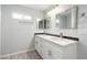 Bright bathroom featuring double sinks, modern fixtures and a clean, updated design at 13616 N 41 Pl, Phoenix, AZ 85032