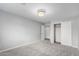 Bedroom featuring plush carpeting, neutral walls, a ceiling light, and a closet at 13616 N 41 Pl, Phoenix, AZ 85032