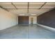 A spacious garage has room for cars and storage at 13616 N 41 Pl, Phoenix, AZ 85032