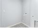 The simple laundry room is ready for your washer and dryer at 13616 N 41 Pl, Phoenix, AZ 85032