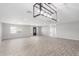 Bright, airy living room featuring modern lighting, wood-look tile floors, and a welcoming open space at 13616 N 41 Pl, Phoenix, AZ 85032