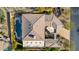 An aerial view of a private pool, patio and the architecture of the building at 14808 E Miramonte Way, Fountain Hills, AZ 85268