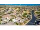 Aerial view of community with Golf Course and neighborhood with desert landscaping at 14808 E Miramonte Way, Fountain Hills, AZ 85268
