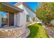 Well-maintained backyard with lush lawn and mature trees, offering a private and serene outdoor space at 14808 E Miramonte Way, Fountain Hills, AZ 85268