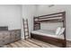 Bedroom featuring a bunk bed with wood frame, and a dresser with ample storage at 14808 E Miramonte Way, Fountain Hills, AZ 85268