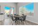 Dining area with a sliding glass door, natural light, and backyard views at 14808 E Miramonte Way, Fountain Hills, AZ 85268