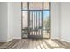 Entryway with a modern glass-panel front door and wood-look flooring at 14808 E Miramonte Way, Fountain Hills, AZ 85268
