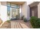 Inviting home featuring a modern door with a large window and a brick walkway at 14808 E Miramonte Way, Fountain Hills, AZ 85268
