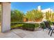 Cozy patio space with stone flooring and desert landscaping provides a tranquil outdoor living area at 14808 E Miramonte Way, Fountain Hills, AZ 85268