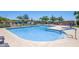 Community pool with lounge chairs and pristine clear water for relaxing on sunny days at 14808 E Miramonte Way, Fountain Hills, AZ 85268
