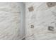 Elegant shower featuring marble tile, dual shower heads, and brushed nickel hardware at 14808 E Miramonte Way, Fountain Hills, AZ 85268