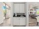 Wet bar with granite countertops and cabinets for storage at 14808 E Miramonte Way, Fountain Hills, AZ 85268