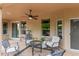 Outdoor patio with furniture, ceiling fan and great natural light at 15481 W Amelia Dr, Goodyear, AZ 85395