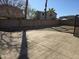 Large backyard with concrete flooring and a wall fence providing ample space and privacy at 16317 N 152 Ave, Surprise, AZ 85374