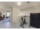 Bright bonus room featuring workout equipment and an open doorway to another living space at 1648 S Faith --, Mesa, AZ 85209