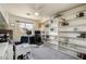 Spacious office featuring bright shelving and a large window for ample natural light at 1648 S Faith --, Mesa, AZ 85209