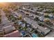Spacious neighborhood featuring diverse homes, serene streets, and mature trees at 1677 E Heather Dr, San Tan Valley, AZ 85140
