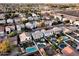 Neighborhood aerial view highlighting diverse home styles, landscaped yards, and community layout at 1677 E Heather Dr, San Tan Valley, AZ 85140